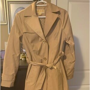 Michael Kors coat. Never worn. Unfortunately too small for me